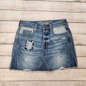 American Eagle Distressed Embellished Patch Denim‎ Mini Skirt